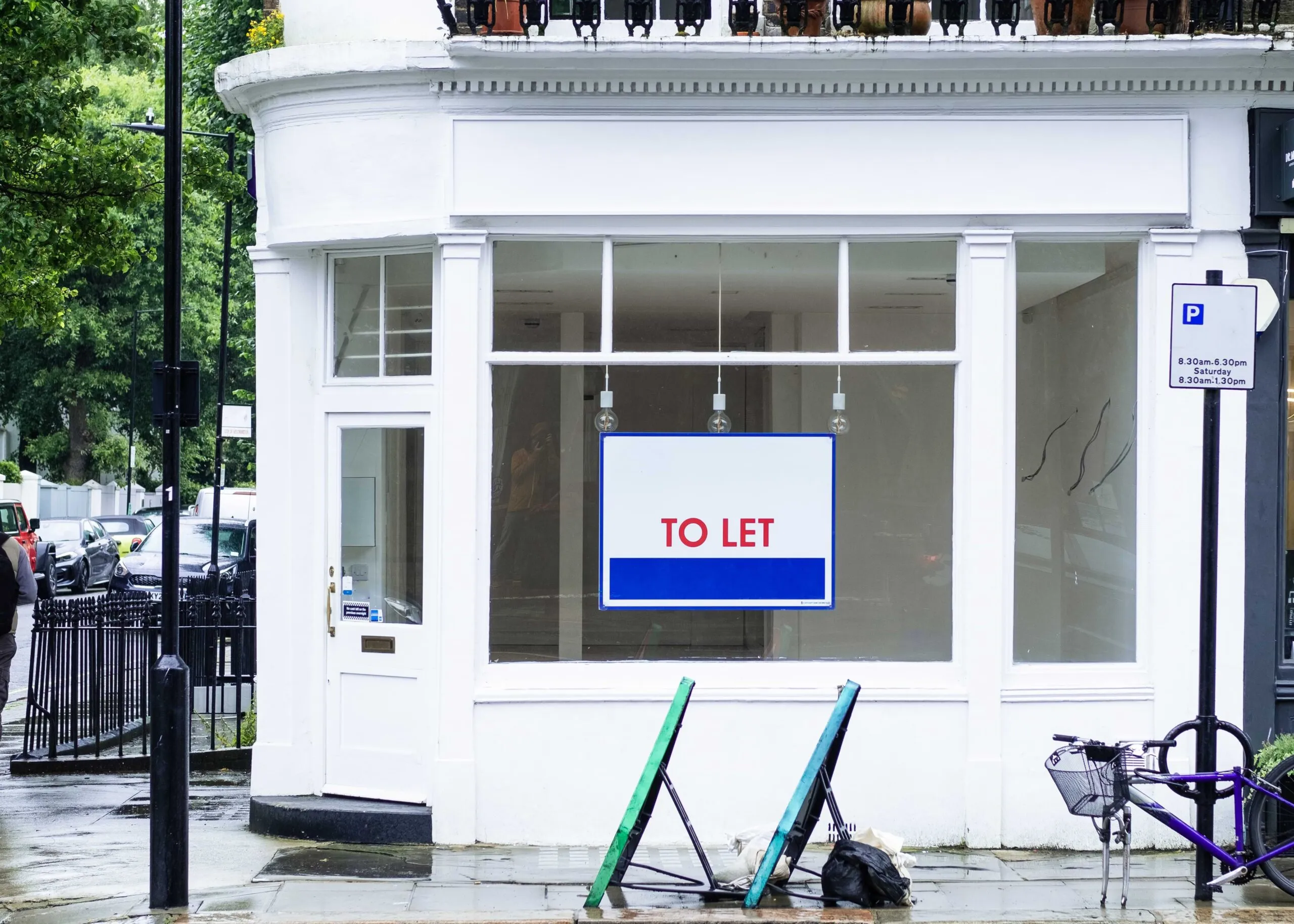 an empty shop with a to let sign in the window, representing commercial landlord insurance